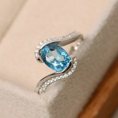 Light Blue Oval Diamond Topaz Ring, Fine Jewelry Light Blue Oval Topaz Ring, Oval Aquamarine Diamond Ring Gift, Oval Aquamarine Diamond Ring As Gift, Fine Jewelry Oval Blue Topaz Diamond Ring, Fine Jewelry Blue Topaz Diamond Ring, Silver Aquamarine Oval Birthstone Ring, Silver Oval Aquamarine Birthstone Ring, Oval Light Blue Topaz Ring