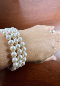 This Adorable 3-strand Japanese Cultured Akoya Pearl Bracelet set of 7.5-8mm AAA quality perfect round Akoya pearls with length of 7 inches ( can be personalized to the length you wanted). It is beautifully knotted with Japanese silk thread and secured with 7mm bead spacing dividers( Silver or 14KT white or yellow gold of your choice). It is the best gift for the bride and add the class and elegancy to your wedding. It can be finished with a Sterling Silver Square/Round Filigree clasp or 14KT Yellow Gold/White Gold Square/Round Filigree clasp. A perfect wedding gift! Elegant Adjustable Hand-strung Pearl Necklace, Elegant Pearl White Beaded Bracelets With 8mm Beads, Elegant Pearl White Bracelets With 8mm Beads, Elegant Pearl Bracelet With 8mm Beads For Gifts, Elegant Hand-strung Pearl Necklace, Round Pearl Bracelet With 8mm Beads, 8mm Round Pearl Bracelet, 8mm Pearl Beads Bracelet, 8mm Pearl Bead Bracelets For Weddings