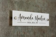 - White Wall Name Plate with Metal Stands & Mounting Fixtures. - Made of Acrylic (10x2.75 inches) - Personalization Included ♦ ORDER WORK FLOW: ♦ 1. In the personalization box, let us know the text that you would like to have engraved. 2. Once your order is placed, we'll send you a design mock-up for you to approve prior to production. We produce and ship within 3-5 business days. » NOTE FOR BUYERS: We do not ship products that are not approved so please keep an eye on your Etsy Inbox. Please al Office Door Name Plates, Door Name Tags, Commercial Bathroom Designs, Acrylic Items, Job Office, Door Office, Door Name Plates, Office Door Signs, Name Plate Design