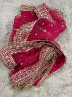 This is a Wedding Dupatta Red Color  made on orders. It is made using dyeable net fabric with pearl work all over.  We stitch beautiful brides lace to all sides of it. Dupatta is having a length of 100 inches and width of around 40 inches. I don't keep it readymade I only make it exclusively for my customers. Can be fully customised. Unstitched Nida Sharara With Dupatta, Wedding Anarkali Set With Dupatta In Chinon, Wedding Salwar Kameez With Dupatta In Dola Silk, Net Sharara For Wedding And Eid, Wedding Traditional Wear With Chinon Dupatta, Semi-stitched Nida Sharara With Sheer Dupatta, Wedding Anarkali Dupatta With Dabka Work, Wedding Sharara In Net Fabric, Pink Unstitched Dupatta For Wedding