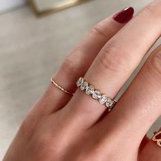 A modern update to the classic eternity band. Platinum or 14k solid gold Diamonds: G/H color VS/SI clarity 1.62 carats, 18 diamonds (~.08 pt each) Carat total weights based on finger size 6 4.2 mm width We recommend ordering 1/4 of a size up from your true finger size to avoid a snug fit, as eternity bands cannot be resized This item is Final Sale and excluded from all promotional discounts. Oval Bezel Wedding Band, Marquise Cut Cubic Zirconia Eternity Band Gift, Diamond White Lab Grown Jewelry With Rose Cut Diamonds, Diamond White Lab Grown Rose Cut Diamond Jewelry, Dainty Diamond Eternity Band With Single Cut Diamonds, Dainty Diamond Eternity Band In Diamond White, Marquise Cut Diamond Eternity Band Gift, Diamond Eternity Band With Marquise Cut, Everyday Rose Gold Diamond Ring With Single Cut Diamonds