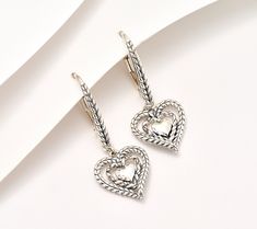 Shower your favorite jewelry fan in love -- and acknowledge what's meaningful to them -- with a gift of these double-heart Symbols of Love earrings. From JAI. Double Heart Pierced Earrings For Mother's Day, Pierced Double Heart Earrings For Mother's Day, Elegant Double Heart Earrings As Gift, Elegant Double Heart Earrings For Valentine's Day, Elegant Heart Earrings For Valentine's Day Anniversary, Elegant Double Heart Earrings As Gift For Her, Elegant Double Heart Earrings For Mother's Day, Elegant Heart-shaped Earrings For Anniversary, Elegant Heart Shaped Earrings For Anniversary