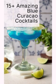 blue curacao cocktail with limes on the side