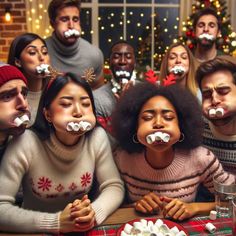 a group of people with fake snowmen on their mouths sitting at a table in front of a christmas tree