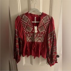 Anthropologie Keira Embroidered Peplum Blouse New With Tags! Size 8 Perfect For Fall!! Red Bohemian Embroidered V-neck Top, Red V-neck Blouse With Floral Embroidery, Festive Fall Blouse With Floral Embroidery, Festive V-neck Embroidered Top, Fall Festive Floral Embroidered Blouse, Red Embroidered Long Sleeve Top For Fall, Red Embroidered V-neck Blouse, Red Long Sleeve Peasant Top With Floral Print, Long Sleeve Red Peasant Top With Floral Print