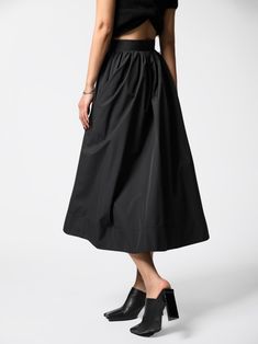 Classic mid-calf length flared and pleated skirt. Voluminous style. Oversized A line skirt. Model is in MINUSEY S. ✔️ Free worldwide express shipping over $100✔️ Loved by 6,500+ customers✔️ Limited edition collections, maximum style⠀⠀⠀⠀⠀⠀⠀⠀⠀Stay ahead of the trend with can’t-find-anywhere-else staples. Your closet will thank you 💕 * MINUSEY S = EU 34, US 2* MINUSEY M = EU 36, US 4* 100% Polyester* Dry clean* Made in Korea - Model Height: 172cm/5'7" (US2, EU34) Black A-line Voluminous Skirt, Black Midi Length Accordion Pleated Skirt, Black Flowy Accordion Pleats Maxi Skirt, Black Pleated Wide Leg Culottes, Black Relaxed Fit Midi Maxi Skirt, Chic Pleated Black Culottes, Black A-line Maxi Skirt With Gathered Details, Black Voluminous Skirt With Accordion Pleats, Black Accordion Pleats Voluminous Skirt