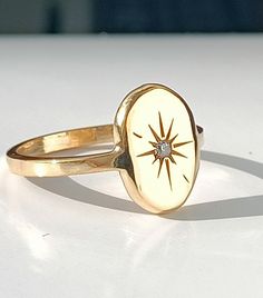 Collection : '' I see lots of stars but none of them is you'' 925 sterling silver 14K Gold Price for 1 ring. Weight for 925 Silver : 3,40gr (approximate) Weight for 14K Gold : 4,50 gr (approximate) FREE Fedex Express Shipping 2-7 business days to Worldwide ✦ Registered mail which require a signature ✦ We need your phone number for Fedex/TNT receipts. ✦ We can't send to PO BOX adresses. Vintage Star-shaped Anniversary Rings, Celestial Gold Signet Ring Stamped 14k, Gold Celestial Signet Ring Stamped 14k, Yellow Gold Starburst Jewelry With Diamond Accents, Antique Yellow Gold Star Jewelry, Celestial Style Gold Oval Diamond Ring, Celestial Style Oval Gold Diamond Ring, Gold Oval Diamond Ring With Celestial Style, Anniversary Starburst Jewelry With Diamond Accents