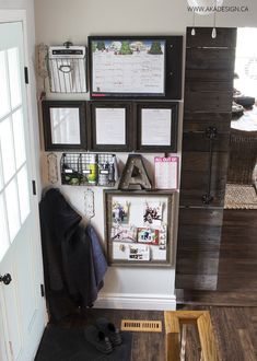 an entryway with several items on the wall