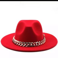 Casual Solid Colored Fedora Hat With Faux Gold Link Chain Detail! The Hat Is The Same Color Throughout! 7cm Brim / 12cm Side/ 56-58cm Top 35% Polyester 60% Cotton #Fedorahat! Trendy Red Adjustable Felt Hat, Trendy Flat Brim Felt Hat For Party, Casual Mini Hats With Flat Brim For Party, Casual Mini Hat With Flat Brim For Parties, Casual Flat Brim Mini Hats For Parties, Trendy Red Fedora Felt Hat, Trendy Curved Brim Hat, Gold Fedora With Short Brim, Trendy Brimmed Felt Hat For Party