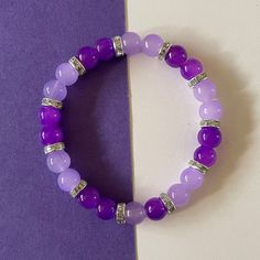 pretty purple bracelet to add to an everyday look Blue And Purple Bracelet, Pretty Bracelets Bead, Purple Beads Bracelets, Glass Bracelet Ideas, Purple Girly Things, Purple Bracelet Ideas, Glass Beads Bracelet Ideas, New Bracelet Designs, Glass Bead Bracelet Ideas