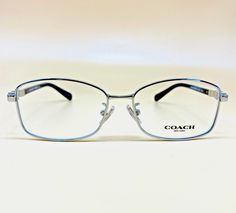 COACH HC5083B  / 9015 -  Woman's Eyeglasses - 51mm - Metal - 51 ◘ 14   135 MADE IN CHINA AUTHENTICITY GUARANTEED 100% ORIGINAL and BRAND NEW ! No Original Case! Product Specs: CATEGORY: Optical Frames GENDER: Women's SHAPE: Oval FRONT MATERIAL: Metal TEMPLE: Plastic BRIDGE DESIGN: Standard GEOFIT: GLOBAL BRAND: COACH MODEL NUMBER: HC6054  / 5002 FRAME COLOR : BLACK LENSES COLOR : DEMO LENS (Clear, no optical glass) SIZE : 51 BRIDGE : 14 TEMPLE LENGTH : 135 SUGGESTED RETAIL PRICE : $140 ITEM CONDITION : New, No Defects! RETURN POLICY: Please create a return request from your order page. Items must be returned within 30 days as UNWORN and UNUSED in original packaging, including the original box, case and cleaning cloth. For your convenience, please use the same shipping box to return the ite Lenses Color, Bridge Design, Global Brands, Optical Frames, Eyeglasses For Women, Eyeglasses Frames, Cleaning Cloth, Temple, Lenses