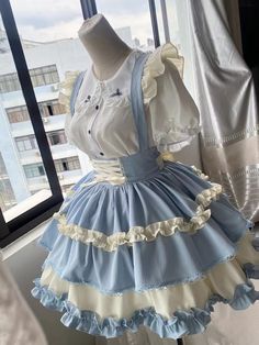 This stunning Lolita skirt features a charming blue and white color scheme, accentuated by a lace-up front and a high waist design for a flattering fit. The detachable straps add a versatile touch, allowing you to customize your look. Embrace the sweet and elegant Lolita style with this beautiful skirt that is perfect for any occasion.   	 		 			Size 			S 			M 			L 		 		 			Waist 			58-82 			64-88 			72-94 		 		 			Full Length 			43 			44 			45 		 		 			Hem Circumference 			426 			426 			426 Kawaii Outfit Ideas, Doll Collar, Fashion Inspiration Design, Sweet Lolita, Really Cute Outfits, Kawaii Clothes, Fancy Outfits, Lolita Dress, Tiered Skirt