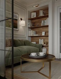 a living room with a couch, coffee table and bookshelf in the corner