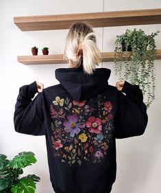 Introducing our vintage-inspired unisex hoodie adorned with a mesmerizing design of pressed flowers. Embrace the allure of autumn with this minimalist masterpiece, where the beauty of the season is brought to life in delicate details. Celebrate the spirit of fall with this hoodie that exudes a sense of nostalgia and appreciation for the changing colors and crisp air. The carefully crafted design captures the essence of autumn, making it a perfect companion for your cozy outdoor adventures or lazy days indoors. This hoodie not only offers a stylish and classic look but also ensures comfort and warmth. Embrace the season's magic with the soft touch of this vintage-inspired hoodie. Find more details here: - 50% cotton, 50% polyester (fiber content may vary for different colors) - Medium-heavy Spring Vintage Hoodie With Relaxed Fit, Vintage Relaxed Fit Hoodie For Spring, Spring Vintage Hoodie With Graphic Print, Vintage Graphic Print Hoodie For Spring, Black Bohemian Hoodie, Bohemian Black Hooded Hoodie, Goblincore Aesthetic, Flower Hoodie, Cozy Outdoor