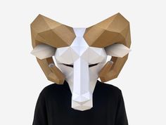 Low Poly Ram Mask - DIY Paper Craft Project. There's no need to wait! Instantly download, print, and make this cute DIY low poly paper Ram mask right in your own home with our printable mask pattern template! This paper craft project comes with detailed instructions. Subscribe and get 10% off your order. http://bit.ly/2CA6Q8U The instant download includes full instructions and the printable pattern pieces you'll need to make this full-head Ram mask! With a few basic supplies that you may already Ram Mask, Diy Ramen, Low Poly Mask, Printable Mask, How To Build Steps, Scissors Crafts, Printable Masks, Mask Cute, Mask Template