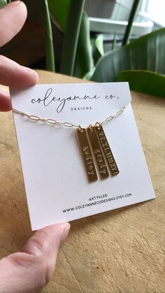 Vertical Bar Paperclip Necklace | Custom Name Necklace, Bar Necklace, Paperclip Necklace The necklace is offered in 14k Gold Filled | Materials | -Vertical bar, 30.8mm x 5.2mm 21 gauge quality 14kt gold filled/rose gold  -Vertical bar, 31mm x 5.1mm 22 gauge quality STG Silver High quality 14k delicate Gold Filled paperclip chain | Details | This necklace is handcrafted and stamped letter by letter, not machine engraved, making this piece truly unique just for you. How to personalize?  Kindly lea Minimalist Personalized Paperclip Jewelry, Gold Rectangular Hand Stamped Jewelry, Rectangular Hand Stamped Gold Jewelry, Minimalist Personalized Paperclip Necklace, Gold Bar Necklace With Nameplate For Everyday, Gold Rectangular Bar Necklace With Name, Minimalist Gold Bar Necklace With Name, Gold Bar Necklace With Custom Name, Necklace Bar