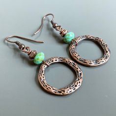 "Copper and Turquoise Hoop Earrings - Textured Antiqued Copper plated Pewter Hoops dangle from Czech Faceted Glass Turquoise Rondelle Beads with a Picasso finish and Small Copper Beads. Hoops are just over .75\" in diameter (size of US nickel) Antiqued Copper Earwires Earrings measure 2\" from top of earwires to bottom hoops." Turquoise Circle Earrings Gift, Birthday Gift Friend, Copper And Turquoise, Silver Dragonfly Necklace, Organic Earrings, Dragonfly Gifts, Woman Birthday, Turquoise Hoop Earrings, Turquoise Hoops