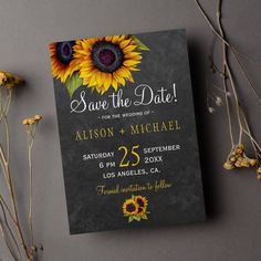 a wedding card with sunflowers on it and the words save the date written in black