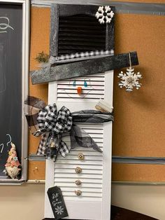 a white door decorated with black and white decorations