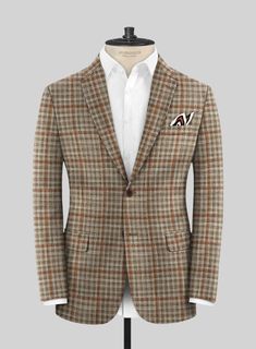 A nod to your profound fashion sense is our Loro Piana Abama Wool Silk Suit, which presents itself as an elegant couture. Tailored with a wool-blended fabric, our suit has an exquisite look in the form of a checks pattern with different shades of brown hue that helps you transform into a royal personality. In addition to the fabric's gentle and light touch, our suit gives your formal wear a stylish twist and comfort at the highest peak. So obtain perfection with this piece that will stay in-tren Luxury Wool Notch Lapel Set, Luxury Wool Suits For Business Meetings, Elegant Couture, Different Shades Of Brown, Checks Pattern, Designer Suits For Men, Silk Suit, Silk Linen, Light Touch