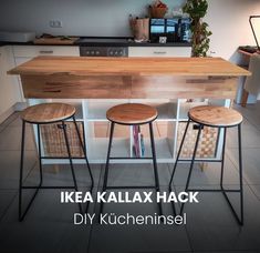 three stools are sitting at the bar in this kitchen with text that reads ikea kallax hack diy kuchennsel