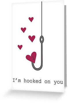 i'm hooked on you card with hearts hanging from a hook and the words, i'm hooked on you