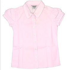 New With Tags Pink Dress Shirt For Girls Size 6-8. Closure Type: Button Sleeve Type: Short Puff Sleeve Material Composition: Cotton/Polyester Oxford Fabric Color: Pink Features:Classical School Uniform Design, Puff Sleeve, Casual, Solid Color, Well Match Girl's Poodle Skirt More Details: Plastic Buttons, Cotton Blend, Contrast Binding Around Neck, Garment Wash Washing And Ironing : Wash With Dark Colors, Gentle Machine Or Hand Wash, Do Not Tumble Dry, Do Not Iron, Do Not Dry Clean. Preppy Pink Tops For School, Preppy Pink Top For School, Preppy Pink Short Sleeve Shirt, Cute Pink Puff Sleeve Tops, Cute Fitted Shirt With Buttons, Preppy Pink Collared Top, Pink Summer School Tops, Pink Shirt For School In Spring, Cute Collared Tops For Play