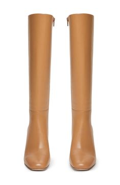 Minimalist detailing extends the wardrobe-spanning versatility of this leather tall boot framed with a softly squared toe and stacked demi-block heel. 3 1/4" heel, 16" shaft (size 8.5) 16" shaft, 15 1/2"  circumference (size 8.5) Side zip closure Leather upper, lining and sole Imported Calf Leather Knee-high Boots With Square Toe, Calf Leather Knee-high Boots With Block Heel For Work, Workwear Knee-high Boots With Stacked Heel And Square Toe, Square Toe Knee-high Boots With Stacked Heel For Work, Block Heel Mid-calf Boots In Calf Leather For Work, Block Heel Calf Leather Mid-calf Boots For Work, Workwear Mid-calf Boots With Block Heel In Calf Leather, Workwear Mid-calf Boots With Block Heel, Sleek Calf Leather Knee-high Boots With Square Toe