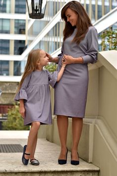 ★ABOUT★ Unique and very elegant dress set for mum and daughter. The mum's dress is adorned with a beautifully arranged puff sleeve with a tight cuff. Daughter's dress has a 3/4 sleeve  with a beautiful finish. The Royal collection is a year-round proposition for Mothers and Daughters who want to shine at any special event.   Non-obvious color and high-quality fabric. In the close-up you can see the fabric, on the photo  looks like heather color  Add accessories (like: bow, sheath)  for the entire family to complete the look. Weddings, family events, holidays, formal meetings- these are just a few suggestions for the Royal collection.  ★FEATURES★ 1. Universal, comfortable, and feminine design 2. Impressive puff sleeve  3. Girl's dress can serve as tunic when it becomes too short 4. Natural Mother And Daughter Clothes Set, Elegant Spring Matching Set Dresses, Elegant Long Sleeve Matching Set Dresses, Matching Mother Daughter Outfits, Mum And Daughter, Christmas Poses, Daughter Outfits, Mother Daughter Matching Outfits, Splendid Dress