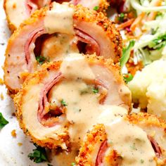 chicken cordon bleu on a white plate