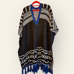 Boho Chic In This Gorgeous Alpaca Wool Poncho By Lemlem Nwt No Visible Imperfections, Soft And Warm One Size Fits Most Made Individually In Ethiopia Hade Made Each Piece Is Different One Of A Kind Piece See Pics For Item Details 2j Traditional Black One-size Poncho, Black Bohemian Poncho Shawl, Black Bohemian Cape For Festivals, Bohemian Black Cape For Festival, Black Bohemian Poncho One Size, Black Long Sleeve Poncho For Beach, Black Long Sleeve Beach Poncho, Casual Black Shawl Poncho, Black Shawl Poncho For The Beach