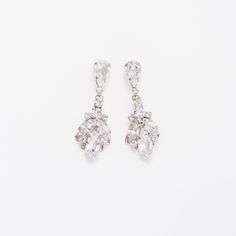 Introducing our IDIL Swarovski Drop Earrings! Inspired by tear drop shaped crystal that trickles down the ear to add a lasting touch to every look. These will look elegant with a casual look or a night out paired with your favorite dress and heels. They are meant to become your earrings of choice for high-style event. Love this earring but looking for something daintier? Check out our NAZ Earrings! Handcrafted with the Highest Quality Materials Swarovski Crystals Platinum plated - Guards against Earring Inspired, Swarovski Drop Earrings, Crystals Earrings, Boutique Couture, Swarovski Crystal Earrings, Earrings Wedding, Drop Earring, Silver Drop Earrings, Wedding Jewelry Sets