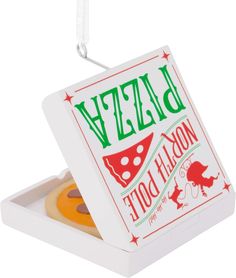 a white box that has some food inside of it on a string hanging from the ceiling