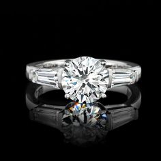 Ross-Simons - 2.50ct t. w. Lab Grown Diamond Three-Stone Ring Round Cut in 14kt White Gold. Size 8. Stellar sparkle. Impressive value. Our radiant three-stone ring features a 2.00 carat round brilliant-cut lab-grown diamond center flanked by .50 ct. t. w. tapered baguette gems of the same kind. Finely crafted in polished 14kt white gold. Lab-grown diamonds are identical to mined diamonds according to their optical, physical and chemical properties. All Ross-Simons lab-grown diamond jewelry in 14 Platinum Baguette Cut Ring With Vvs Clarity, Luxury Gia Certified Diamond Ring With Round Stone, Gia Certified Dazzling Platinum Diamond Ring, Gia Certified Platinum Diamond Ring With Round Stone, Platinum Diamond Ring With Vs Clarity, Luxury Gia Certified Round Diamond Ring, Platinum Diamond Ring With Vs Clarity Baguette Cut, Fine Jewelry Diamond Ring With Brilliant And Baguette Cuts, Fine Jewelry Diamond Ring With Baguette Brilliant Cut