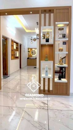 the inside of a store with white marble floors and wooden shelves filled with jewelry on display