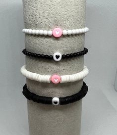 This listing is for 1 heart stretch bracelet. Options are- White round beads w/pink heart, white heishi beads w/pink heart, black round beads with black heart, black heishi beads with black heart, white heishi with hot pink heart (third photo), & black heishi with hot pink heart(third photo). These bracelets are perfect for your kids, their friends, or yourself!  5.5 inches is best suited for a child. 6.5 inches is most requested size for women. Please message me with any questions P.S. I love you was founded to commemorate the shop owner's late father. May we always remember to tell the people in our lives that we love them. Hot Pink Heart, Valentines Bracelets, Bracelet Inspiration, Heart To Heart, Heishi Beads, Colorful Bracelets, Black Heart, Heart Bracelet, Always Remember