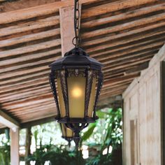 an outdoor light hanging from the ceiling