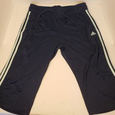 Adidas Climalite Crop Pants. Size Large, Nwot! Navy With Light Blue Accents. Blue Adidas Activewear For Jogging, Blue Adidas Bottoms For Jogging, Adidas Blue Sweatpants For Jogging, Adidas Joggers For Sports, Blue Adidas Athleisure Pants, Adidas Blue Joggers For Sports, Adidas Sweatpants With Three Stripes For Workout, Blue Activewear For Jogging With Three Stripes, Three Stripes Workout Bottoms For Sports Season