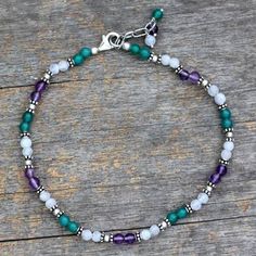 Amethyst and Rainbow Moonstone Anklet - Head Over Heels | NOVICA Moonstone Anklet, Ankle Bracelets Diy, Handmade Anklets, Ankle Jewelry, Beaded Anklets, Beaded Bracelets Diy, Head Over Heels, Anklet Jewelry, Bijoux Diy