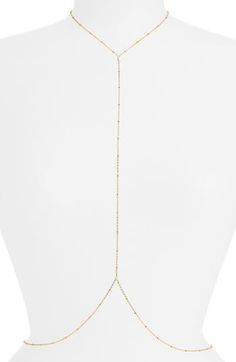 Glam up your look with this dainty body chain detailed with beaded stations for elegant sparkle. 18k-gold plate or sterling silver plate Made in the USA or imported Adjustable Delicate Body Chain, Gold Beaded Chain Adjustable Body Jewelry, Gold Dainty Body Jewelry For Party, Elegant Gold Dangle Body Chain, Gold Delicate Chain Body Chain Gift, Minimalist Gold Body Chain, Dainty Gold Body Chain For Party, Gold Lariat Body Chain Gift, Gold Dangle Body Jewelry With Adjustable Chain