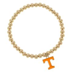 This Tennessee Volunteers Enamel Logo Ball Bead Stretch Bracelet is the perfect finishing piece for your game day getup. The intricate team logo ensures that your fandom stands out in a chic way and the comfortable design makes this stretch bracelet a cute and easy-to-wear accessory. Upgrade your look for the next Tennessee Volunteers game with this Enamel Logo Ball Bead Stretch Bracelet. Sporting Event, Upgrade Your Look, Tennessee Volunteers, Enamel Charms, Beaded Stretch Bracelet, Bracelets And Charms, Stretch Bracelet, Base Metal, Gold Beads