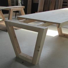 the table is made out of wood and ready to be built into some kind of furniture