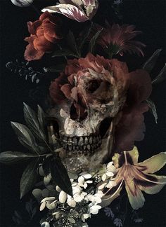 a skull surrounded by flowers on a black background