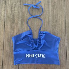 Handmade state scrunch top. Perfect for tailgates or showing spirit! Collegiate Blue Tops For Cheerleading, Stretch Summer Tops For College, Collegiate Tops For Spring Sports Events, Collegiate Tops For Sports Events In Spring, Collegiate Style Tops For Spring Sports Events, Collegiate Style Fitted Tops For Spring, Casual Tops With Team Name For Tailgating, Stretch Tops With School Spirit For Summer, Fitted Tops For Game Day In Spring