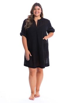 Plus Size Resort Wear Cover up around the resort in style with our soft, lightweight, plus size cotton over shirt. Wear the sleeves long for sun protection or roll them up and secure with the tab and button for a stylish look you can wear on and off the beach. Stylish black is always a classic option to wear with any swimsuit. Great Side Pockets Roll Up Sleeves with Button Detail Fabric: 100% Cotton Red head model wears size M Overshirt Measurements in Centimetres Small Medium Large XL XXL Bust Casual Upf 50+ Cover-up For The Beach, Casual Upf 50+ Beach Cover-up, Casual Relaxed Fit Beach Cover-up, Casual Loungewear Cover-up With Upf 50+, Casual Relaxed Fit Cover-up For Loungewear, Oversized Cotton Casual Cover-up, Casual Cotton Long Sleeve Cover-up, Oversized Black Tops For Vacation, Casual Cotton Beach Cover-up