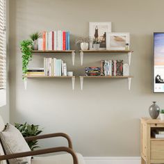 a living room filled with furniture and bookshelves