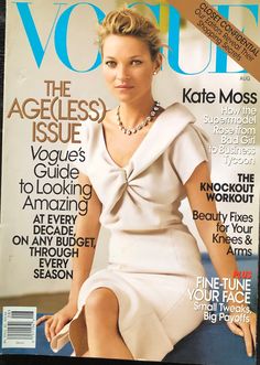 a woman sitting on top of a magazine cover wearing a white dress and pearl necklace