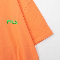 A T-shirt with a simple FILA logo design.
 One size fits all and can be worn by both men and women.

 A FILA T-shirt series featuring models worn by global artist BTS.

 One size: Length 67cm Shoulder width 45cm Sleeve length 21cm Bust 106cm Hem width 54cm

 Body: 100% cotton
 Rib: 95% cotton, 5% polyester

 Notes: ■Size: Actual dimensions are measured when laid flat. Please note that there may be slight differences in size depending on the material.

 ■Regarding color: Please note that the col Basic Short Sleeve Logo T-shirt, Basic Logo T-shirt With Short Sleeves, Basic Short Sleeve T-shirt With Logo, Urban Short Sleeve Logo T-shirt, Urban Style Short Sleeve Logo T-shirt, Urban Short Sleeve Top With Logo, Orange Crew Neck T-shirt With Logo Print, Basic Orange Tops For Streetwear, Casual Short Sleeve Logo Top