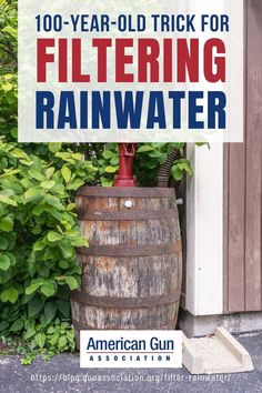 an old wooden barrel sitting next to a sign that says 100 year - old trick for filtering rainwater