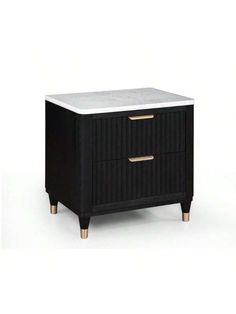 a black and white nightstand with two drawers on one side, gold trimming around the top